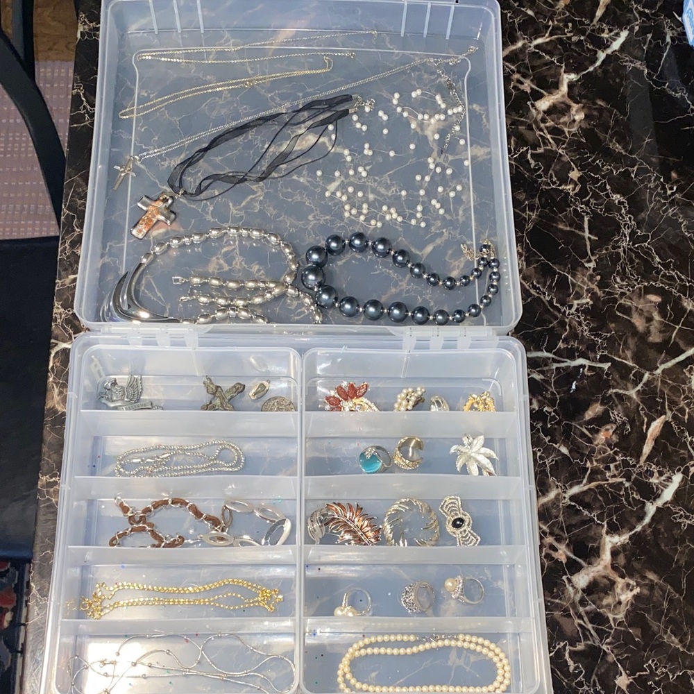 Mystery box of assorted jewelry. Organizer included